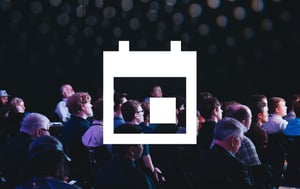 a crowd at a conference
