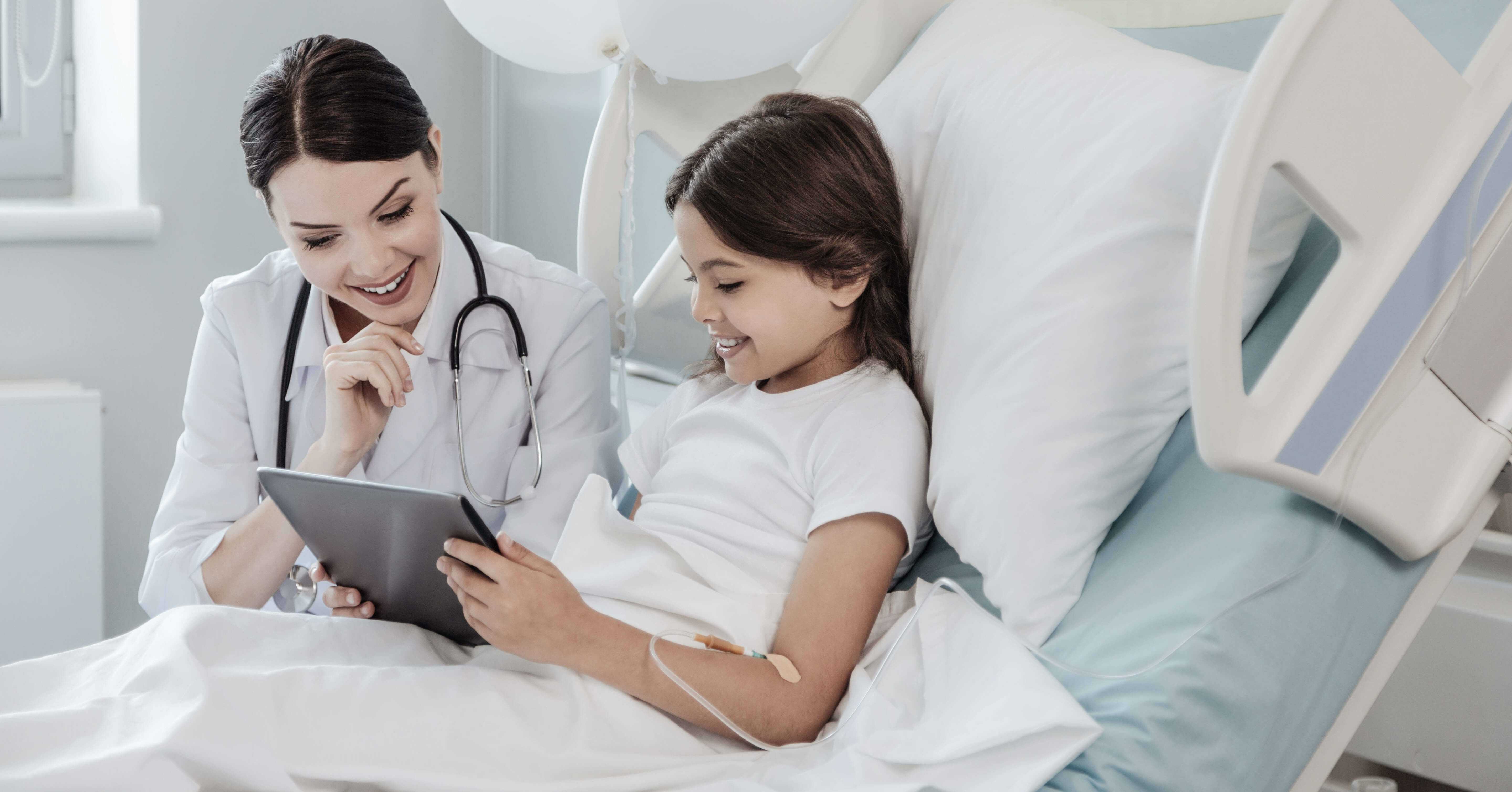 doctor and patient using tablet to watch hospital tv package