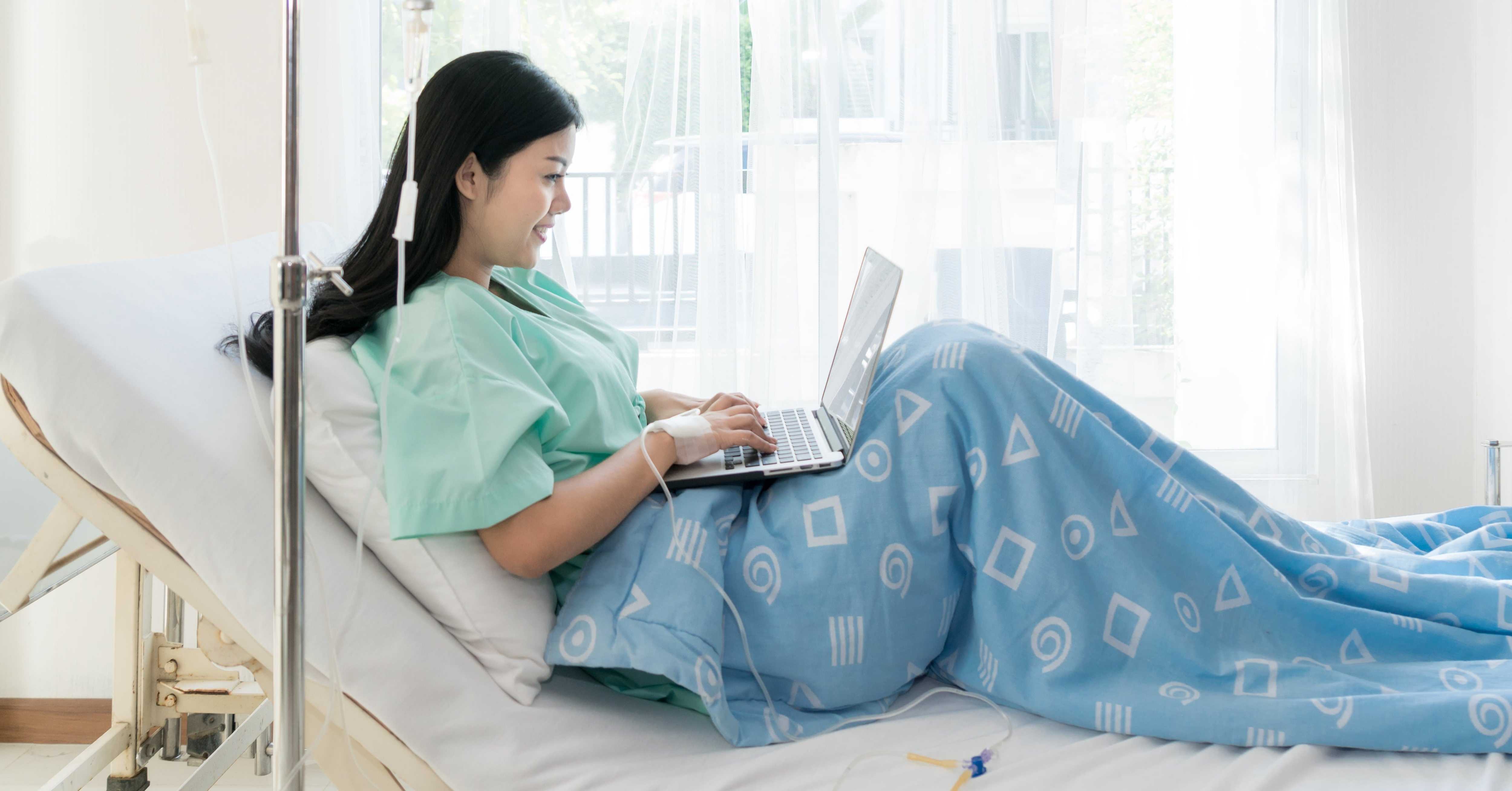 Patient using WiFi in bed