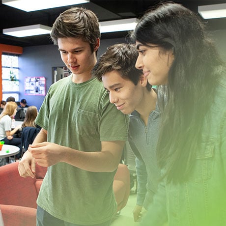 three students working