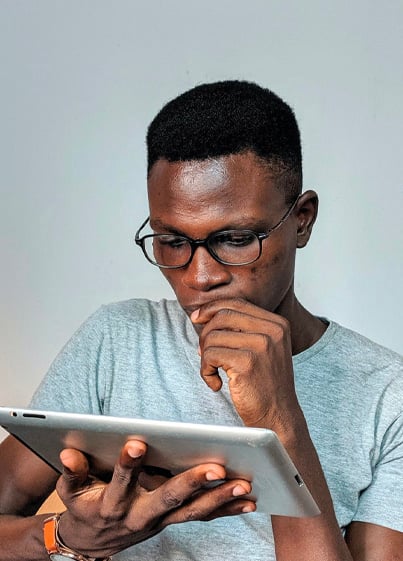 Man looking at iPad Pro