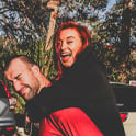 Woman being carried on mans back