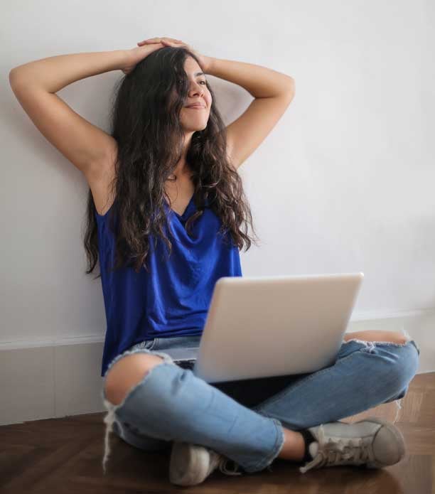 relaxed-woman-on-laptop-flipped