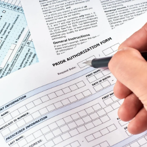 Authorization form being filled out before improved revenue access
