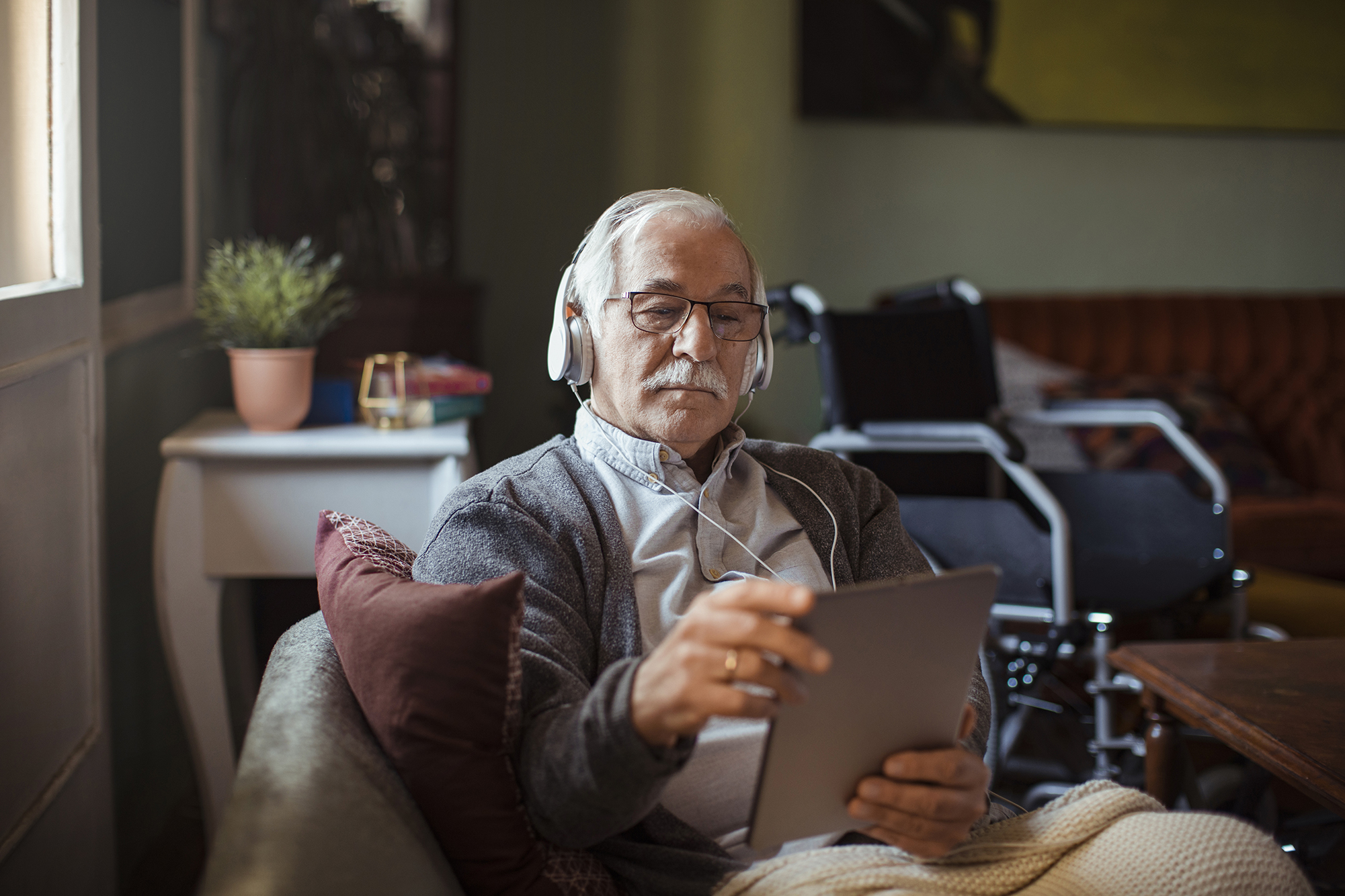older man using technology