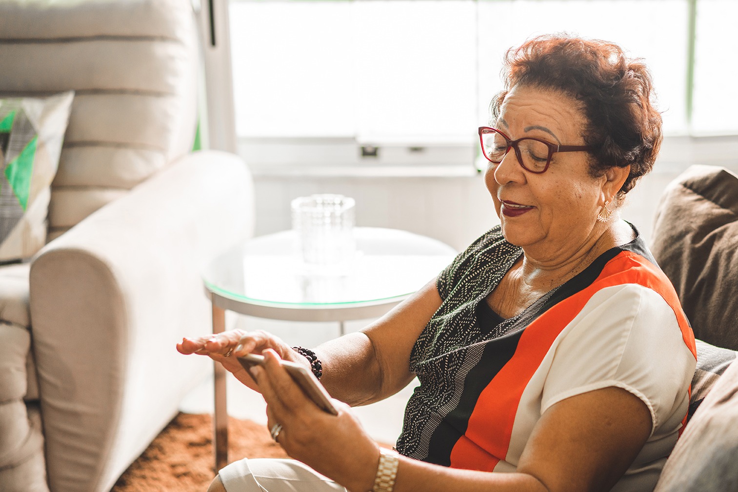 old woman looking at phone