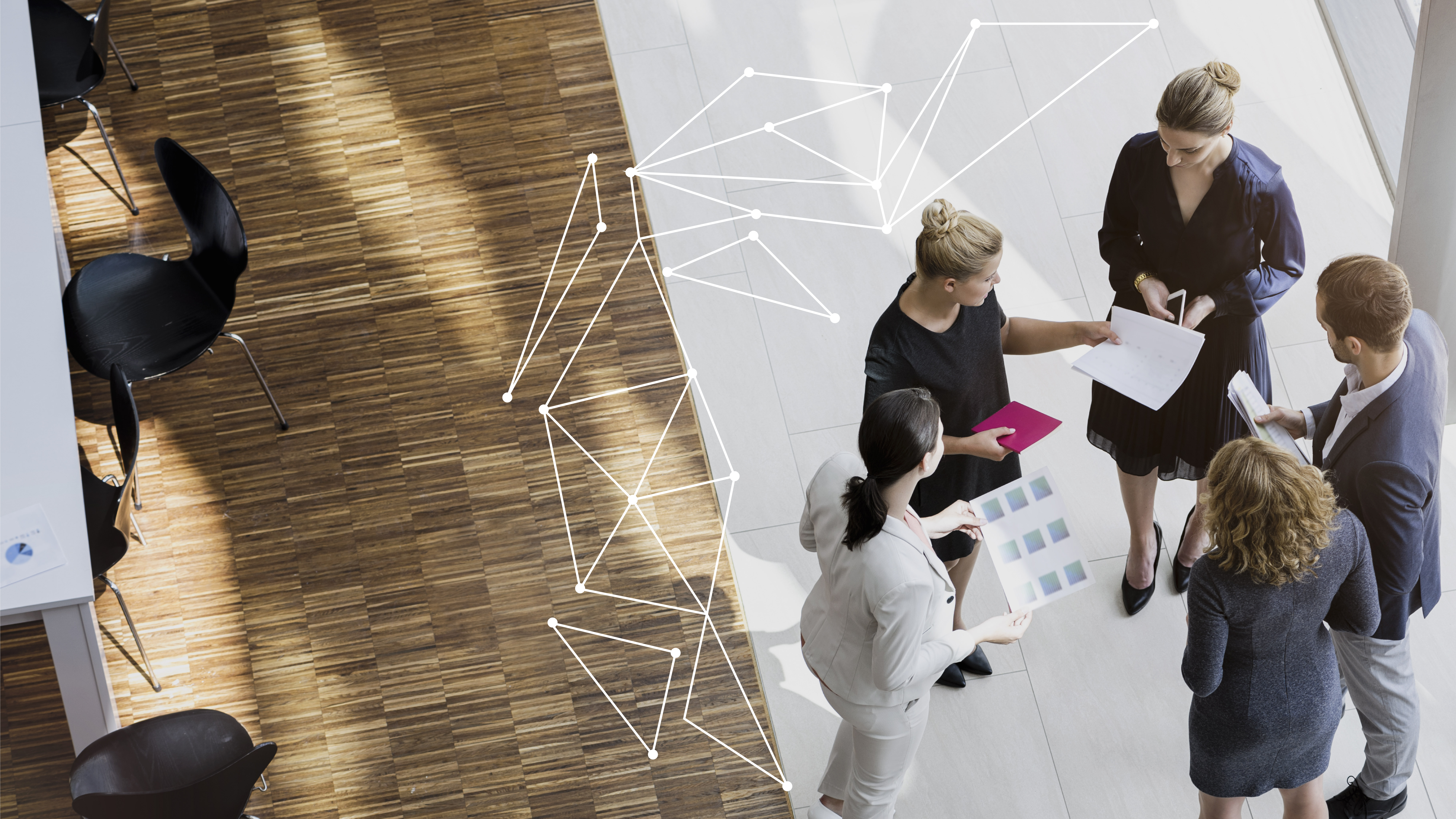 Business people standing in office planning and talking