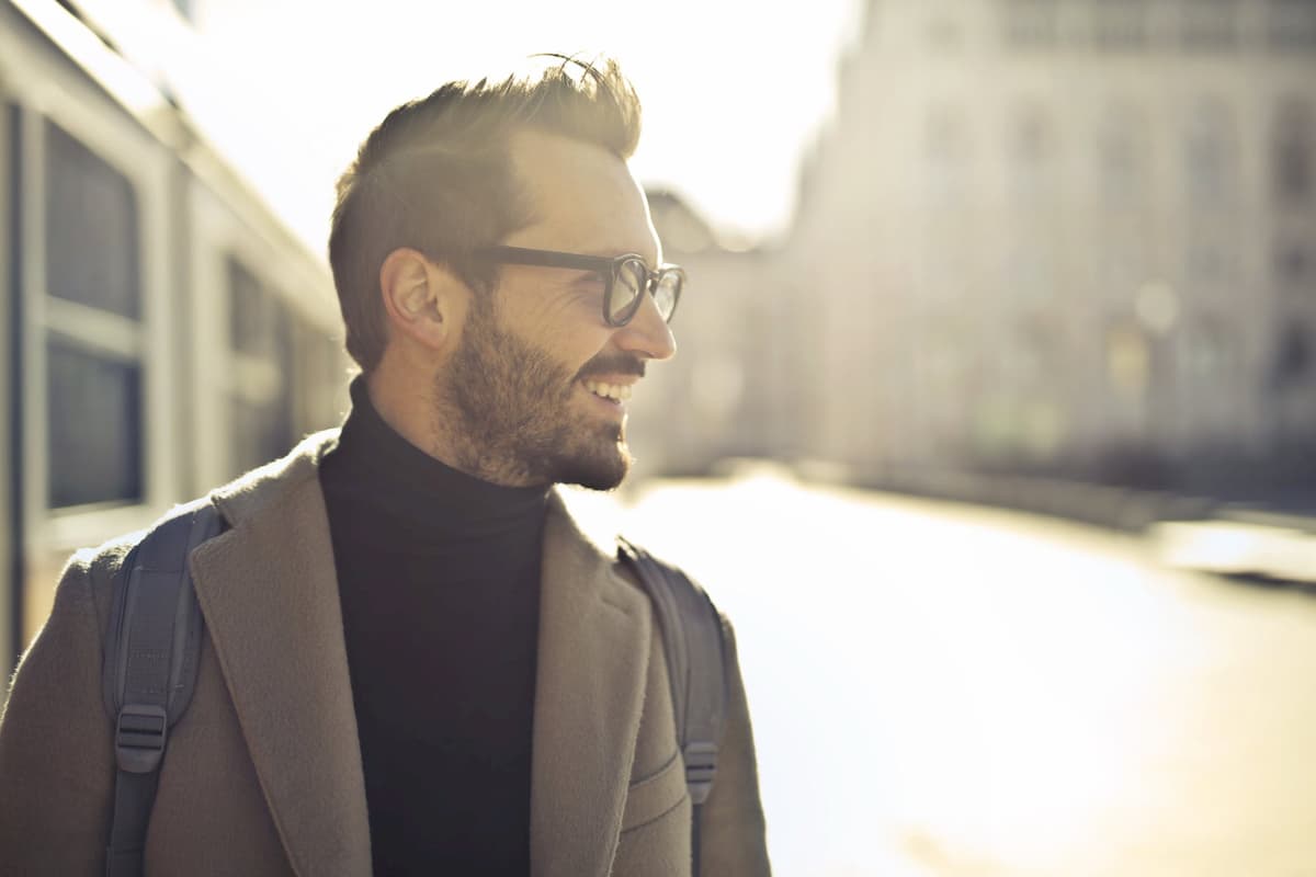 Man with receding hairline smiling