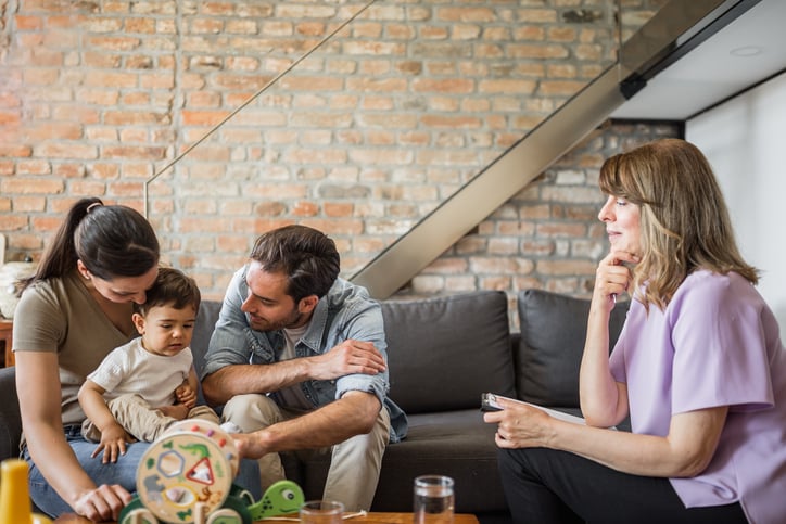 BCBA working with child with autism and his family