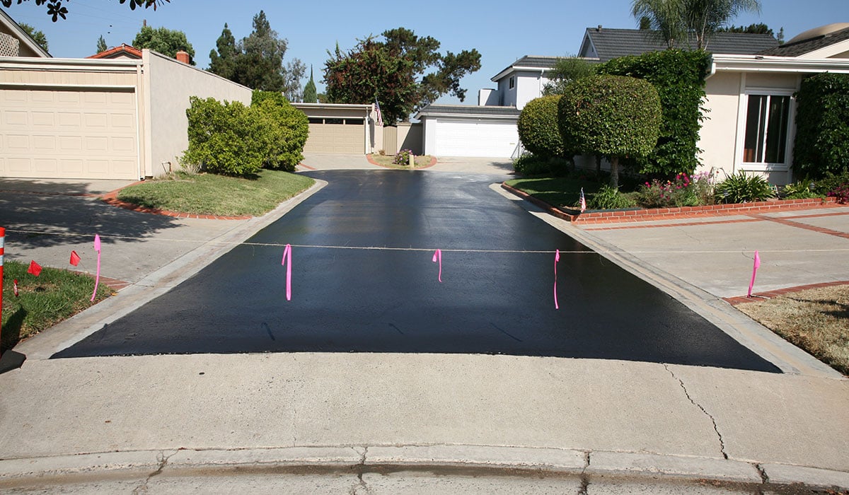 How Long to Stay off Driveway After Paving: Essential Timing Tips
