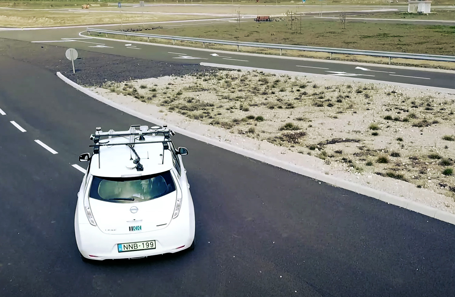 car driving on test course with Ouster lidar