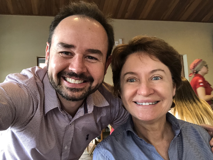 Dr. Palo (left) and patient, post treatment.