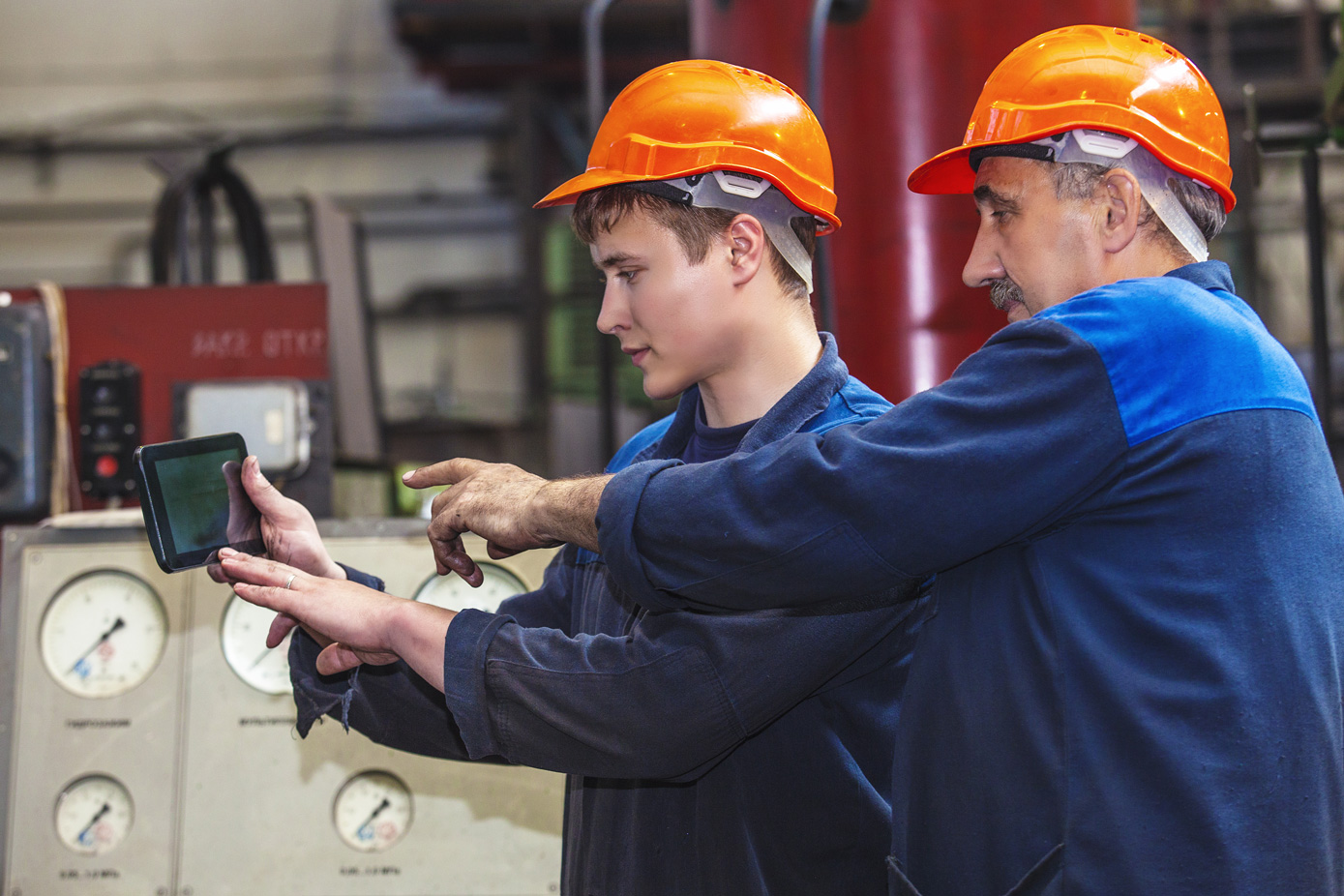 Old and Young Men in Factory